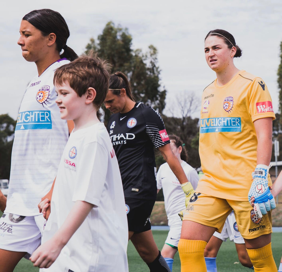Mel Maizels walking out for Perth Glory in KeepHer gloves
